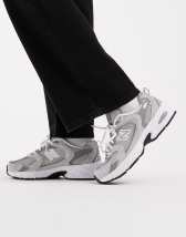 New Balance 530 trainers in light brown and leopard print