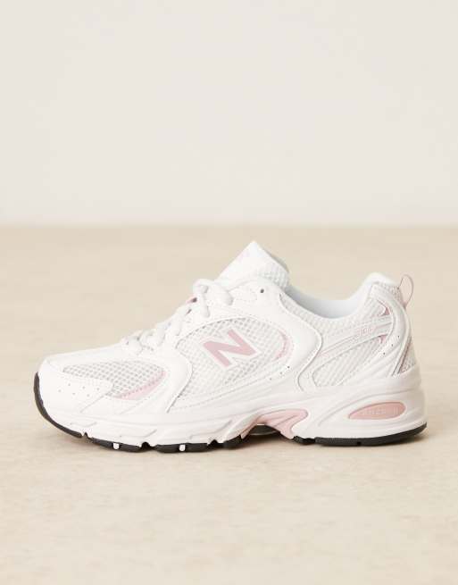 New Balance 530 unisex trainers in white and pink