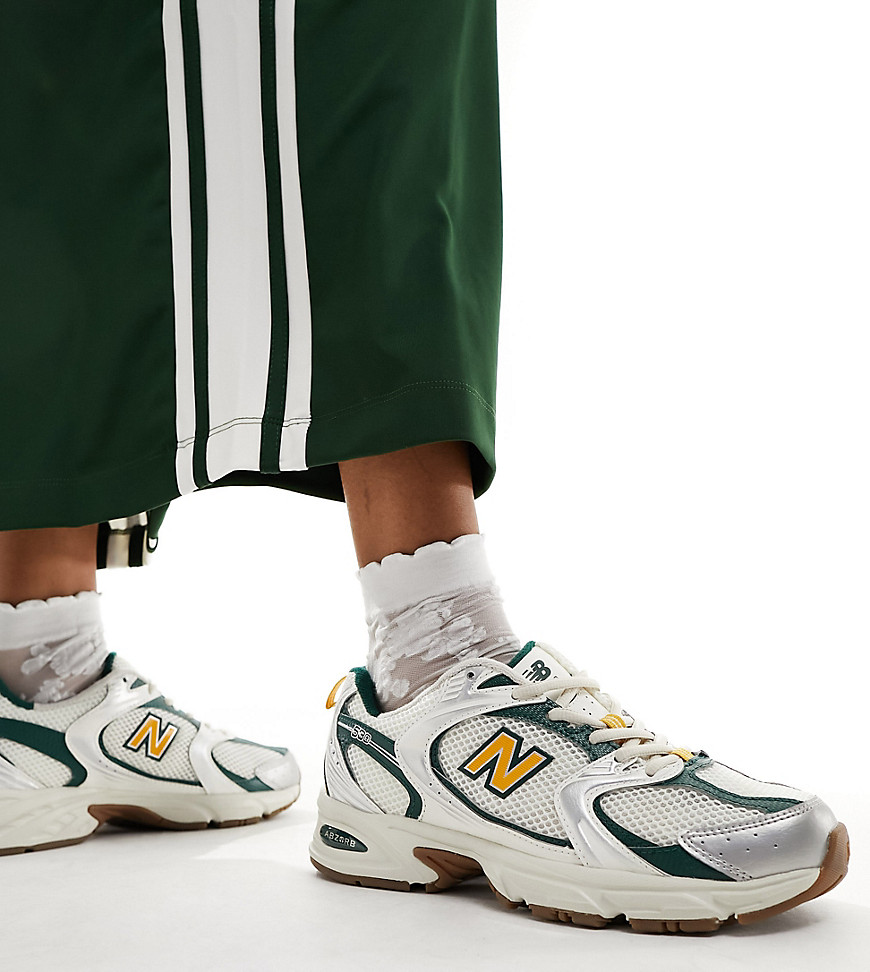 New Balance 530 collegiate sneakers in white green and gold Exclusive at ASOS - WHITE