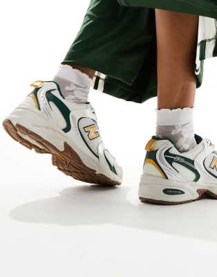 New Balance 530 collegiate sneakers in white green and gold Exclusive at ASOS ASOS