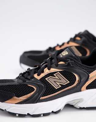 new balance 530 black trainers