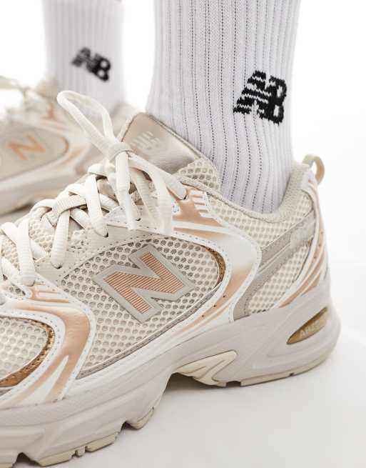 New Balance 530 Sneaker in Metallic Hellgold exklusiv bei ASOS