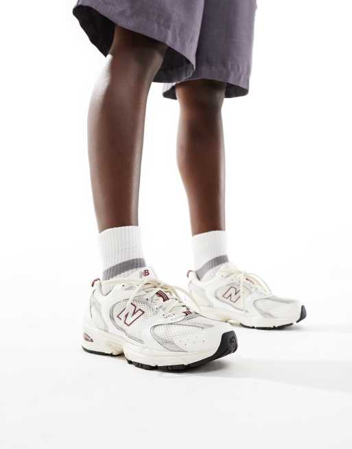 New Balance 530 trainers in white and burgundy