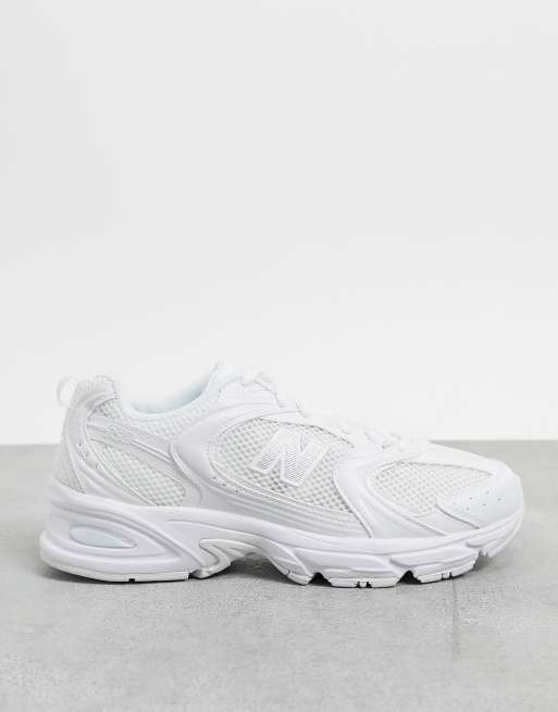 Solid white new balance clearance shoes