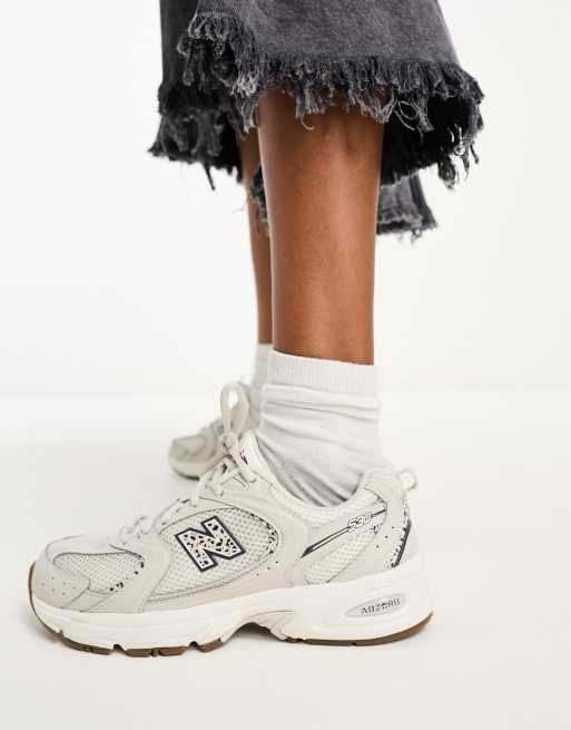 New Balance 530 trainers in beige and leopard print - exclusive to ASOS