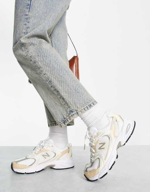 New Balance 530 sneakers in beige and silver Exclusive to ASOS