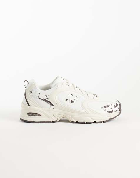 New Balance 530 sneakers in gebroken wit en koeienprint - view 1