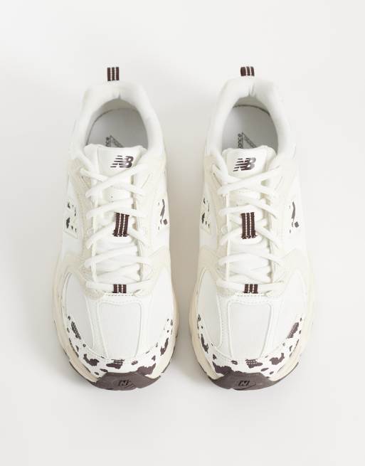 New Balance 530 sneakers in gebroken wit en koeienprint, 3 van 5