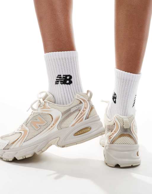New Balance 530 sneakers in gold exclusive to ASOS