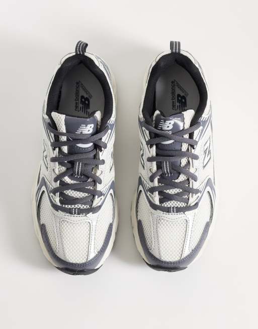 New Balance 530 sneakers in gray and silver, 2 of 5