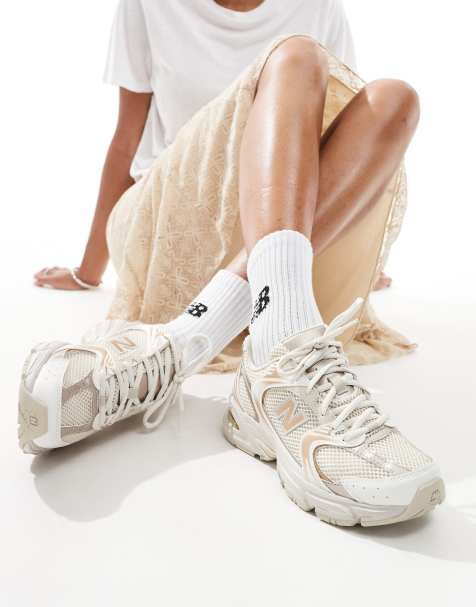 New Balance 530 sneakers in light gold metallic - exclusive to ASOS - view 1