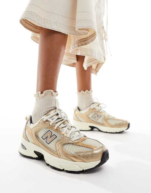 New Balance 530 sneakers in metallic bronze