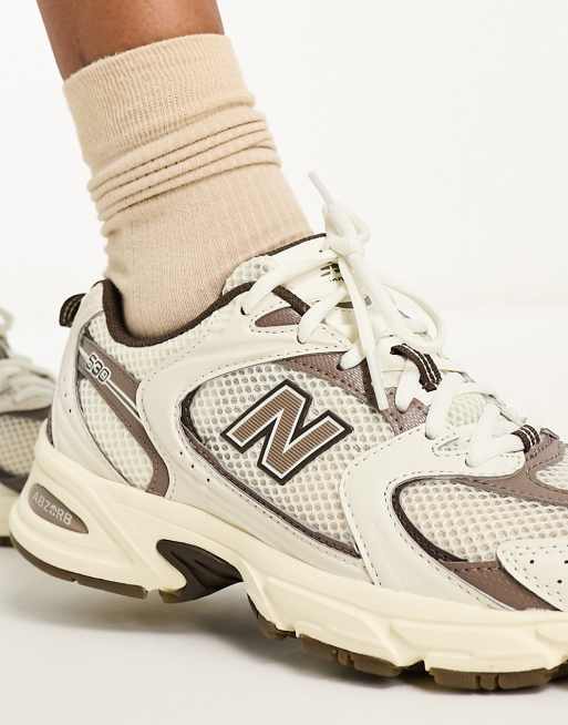 New Balance 530 sneakers in off white and beige - exclusive to ASOS