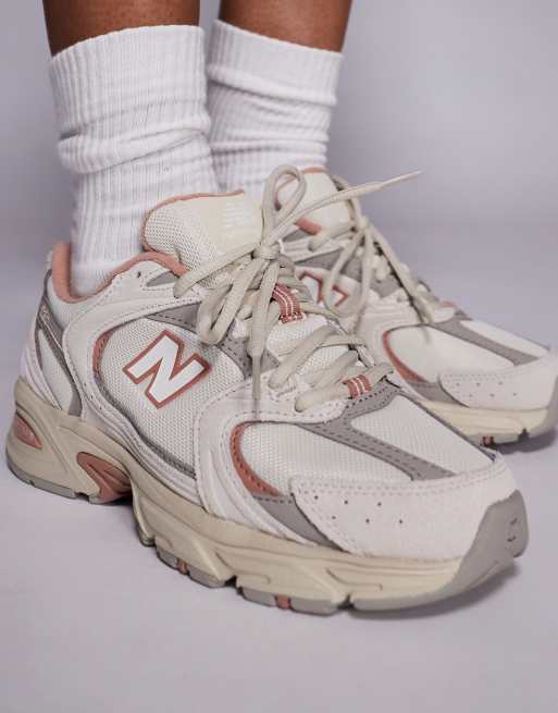 New Balance 530 sneakers in off white and red detail