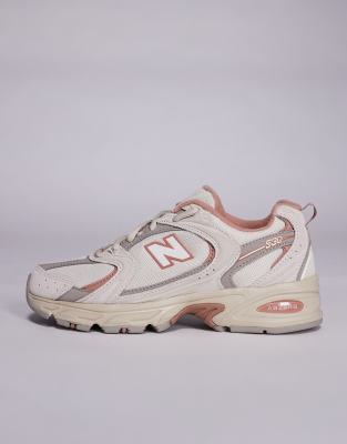 New Balance 530 sneakers in off white and red detail
