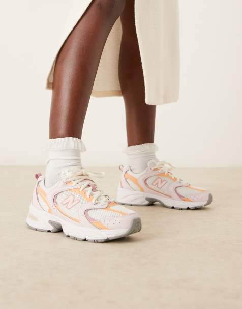 New Balance 530 sneakers in orange and pink - view 1