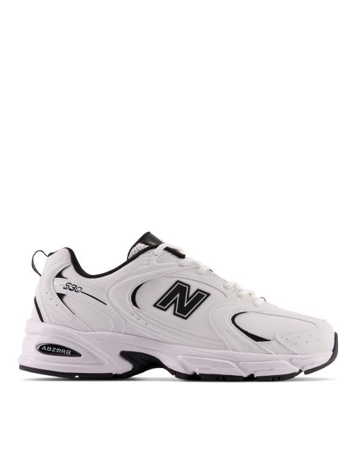 New Balance 530 sneakers in white and black