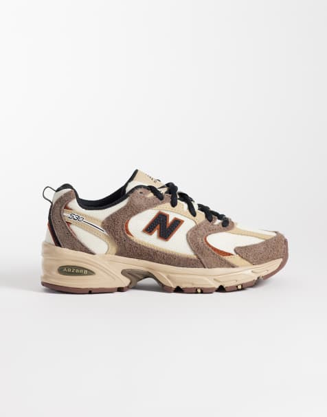 New Balance 530 sneakers in white and brown - view 1