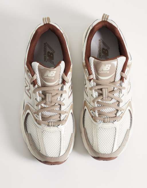 New Balance 530 sneakers in white and brown, 2 of 5