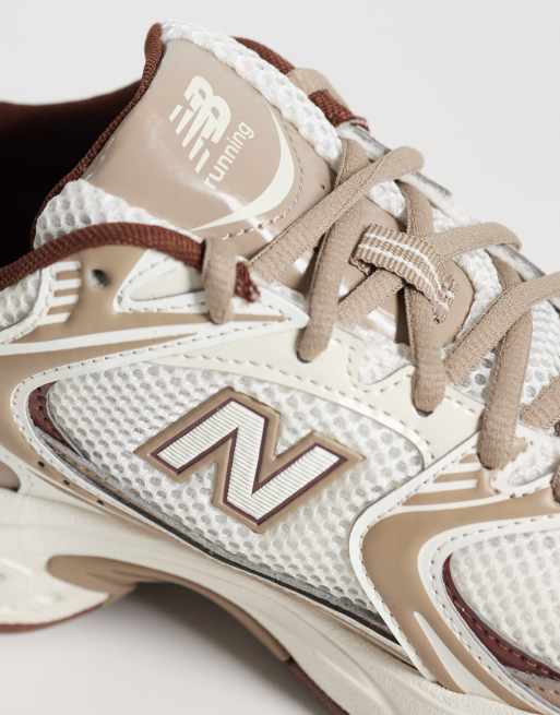 New Balance 530 sneakers in white and brown, 3 of 5