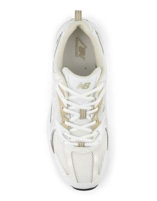 New Balance 530 sneakers in white and gold detail | ASOS