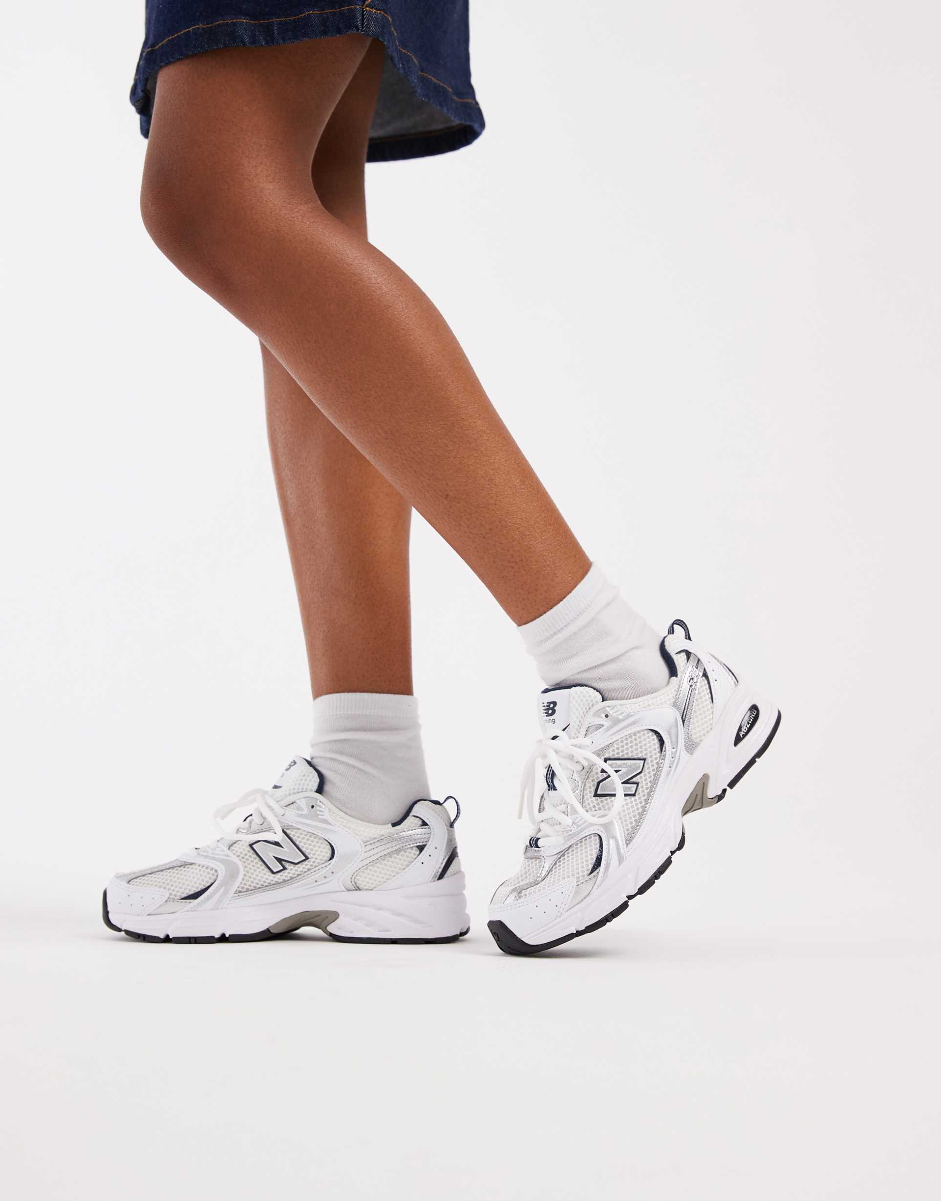 new balance 530 sneakers in white and gray