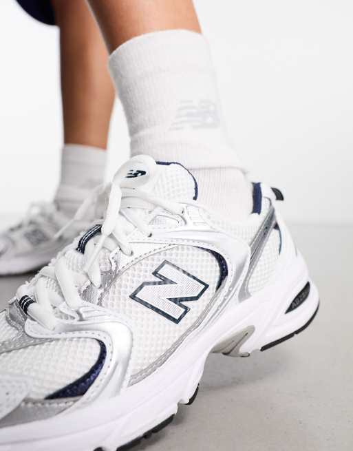 New Balance 530 sneakers in white and gray