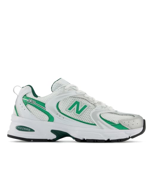 New Balance 530 sneakers in white and green