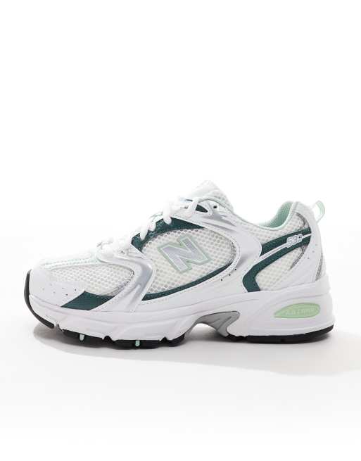 New Balance 530 sneakers in white and green