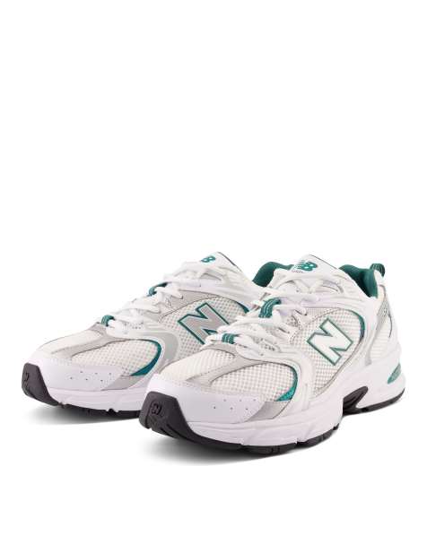 New Balance 530 sneakers in white and metallic with blue detailing - view 1