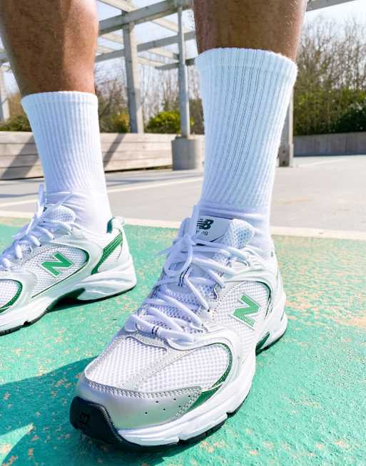 New Balance 530 sneakers in white and mint green ASOS