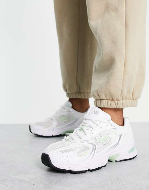 New Balance 530 sneakers in white and pastel green exclusive to