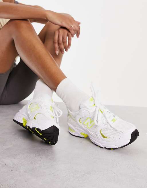 New Balance 530 sneakers in white and yellow ASOS