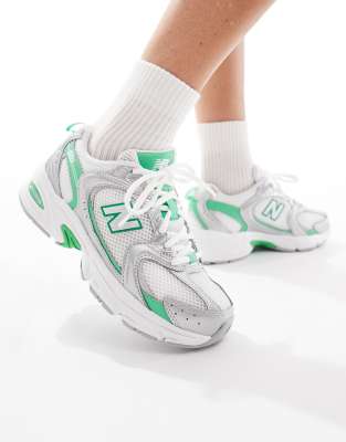 New Balance 530 sneakers in white, silver and green detail - view 1