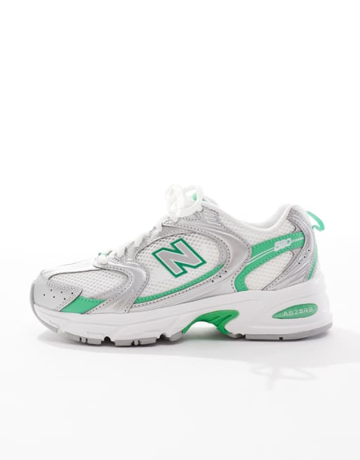 New Balance 530 sneakers in white, silver and green detail