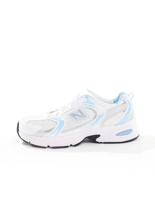 New Balance 530 sneakers in white with blue detail, 2 of 5