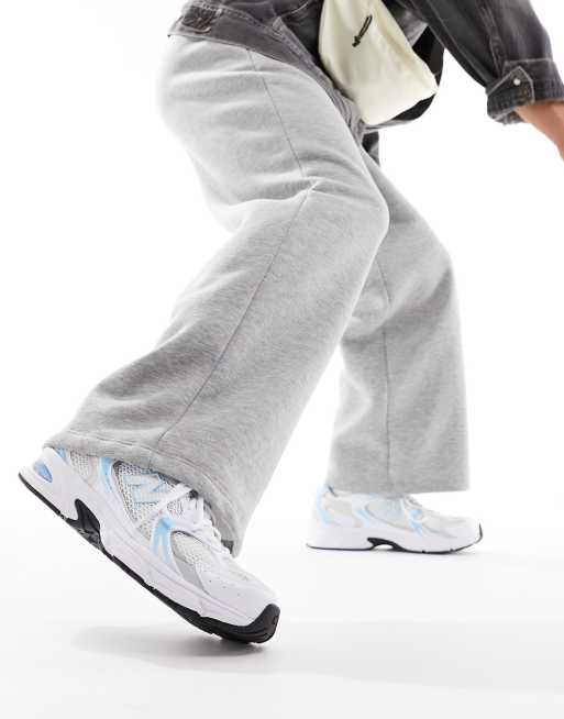 New Balance 530 sneakers in white with blue detail, 4 of 5