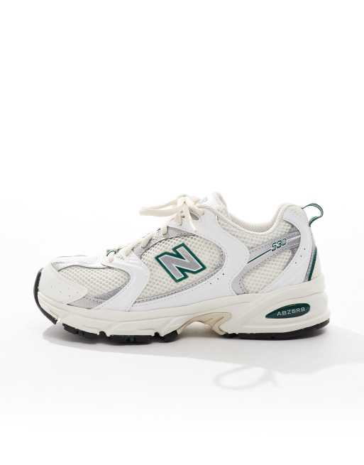 New Balance 530 sneakers in white with green and gray details