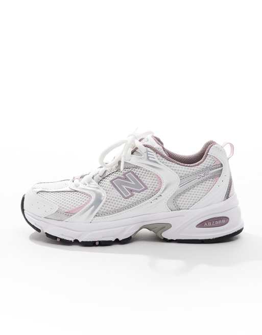 New Balance 530 sneakers in white with pink details