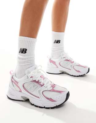 New Balance 530 sneakers in white with pink metallic details ASOS