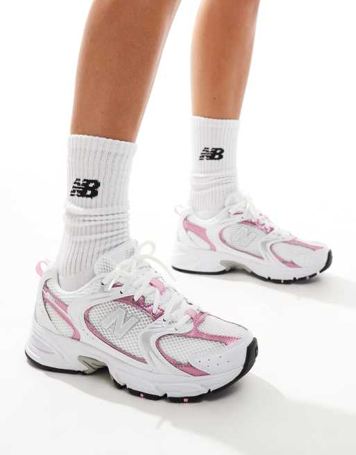 New Balance 530 sneakers in white with pink metallic details