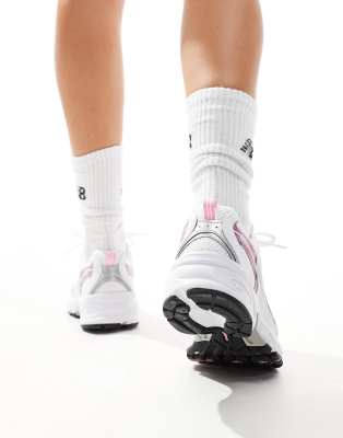 New Balance 530 sneakers in white with pink metallic details