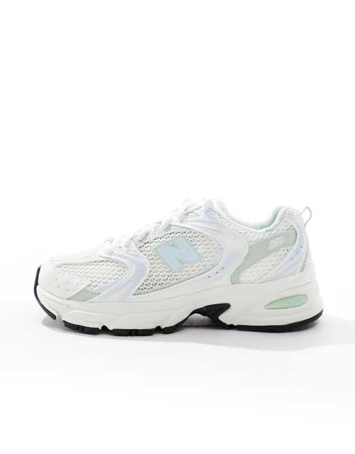 New Balance 530 sneakers in white with sage and light blue detail