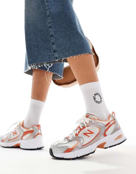 New Balance - 530 - Sneakers in wit en oranje - view 1
