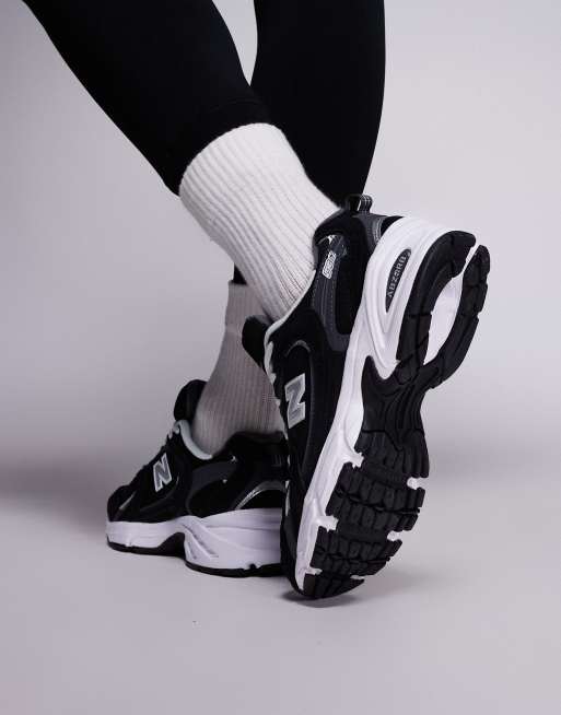 New Balance - 530 - Sneakers in zwart , 3 van 5