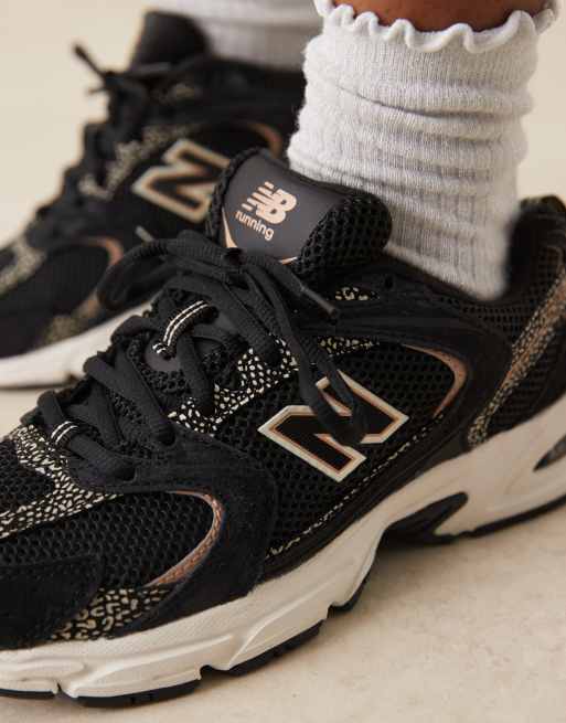 New Balance – 530 – Svarta och leopardmönstrade sneakers, 3 av 5