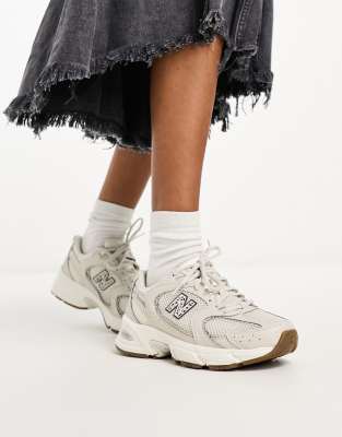 New Balance 530 trainers in beige and leopard print - exclusive to ASOS