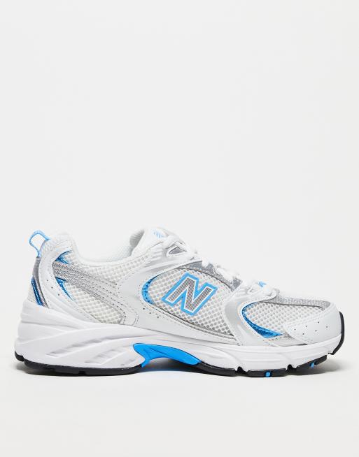 New Balance 530 trainers in white and blue