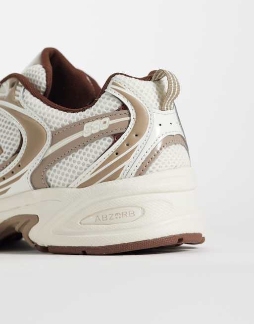 New Balance 530 trainers in white and brown, 2 of 5