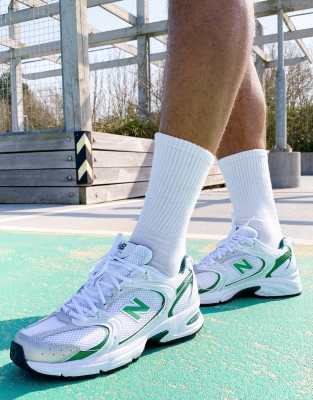 green nb trainers